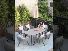 Ensemble de meubles de patio de loisirs avec des fauteuils en rotin PE de style européen et une table en aluminium